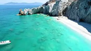A short flight over Lalaria-Beach in Skiathos, Greece