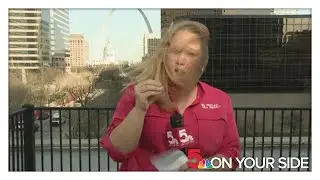 The struggle in the wind is real as reporter battles strong winds ahead of severe weather