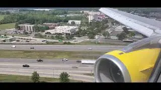 Rough landing! View of engine fan, thrust reversers, and spoilers. Detroit airport. Spirit Airlines.