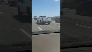 Man in Back of Truck on Freeway #freeway #drivers #truck #drivinginback