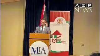 Minister Saddam Hosein explains the land allocation in the Land for the Landless Program