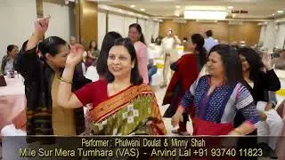 Daulat Phulwani ji and Minny Shah ji presenting 