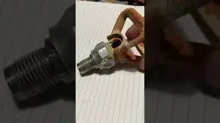 Removing a frozen sprayer tip holder guard on a Graco sprayer gun