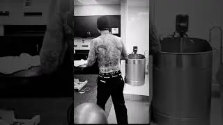 Travis Barker taking a cold bath