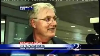 Passenger Tries To Open Plane Exit In Flight