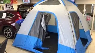 Setting up a Honda tent on a new 2015 Honda CR-V at Westgate Honda