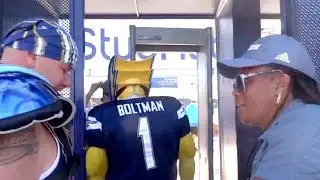Boltman enters StubHub Center with mask on