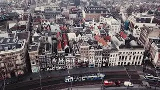 Buildings and Bridges along Amstel River | Flight over Amsterdam, Netherlands | Drone Video | 4K