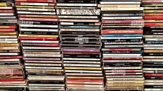 Flip through of a Thrift Stores CDs that I received for Free