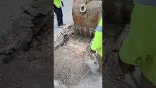 Digging down to get a shot on a main water line #construction #workers