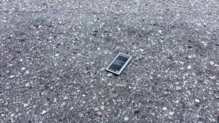 Puncturing a lithium phone battery.