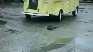 Yellow Citroen Van on road driving test