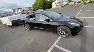 Tesla towing popup camper in iceland