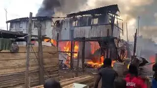 Fire destroys timber market in Accra.