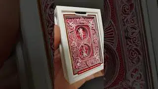 Person Uses Deck of Playing Cards to Create 3D Art Structure - 1206800