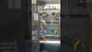 Side-Entry In-Mold Labeling System | NPC Injection Molding Machine