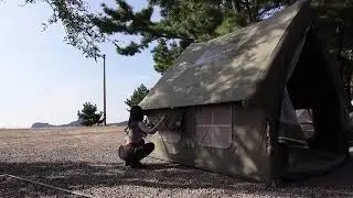 Camping on the beach and walking the dog, then cooking and enjoying some steamed shrimp.