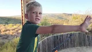 Loading and shooting a Gamo kids air rifle on the farm.