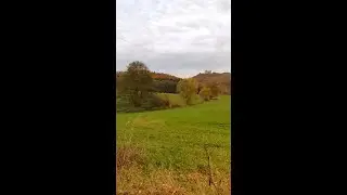 Walk through the autumnal Rh&ouml;n, view to castle Bieberstein