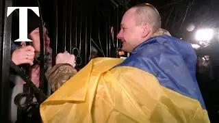 Emotional scenes as Ukrainian POWs met by their families