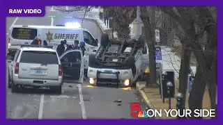Raw video: Surveillance video shows aftermath of crash involving St. Louis police SUV near downtown