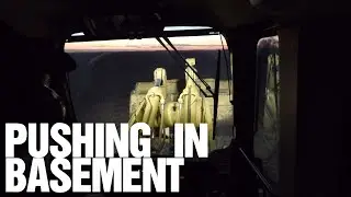 Burning Daylight Pushing In A Basement with a CAT 973c Track Loader