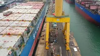Boarding a container ship at Colombo Dockyard by the Crane bucket