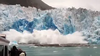 Giant ice shelf collapsing into the sea