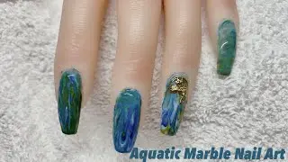 Aquatic Marble Nail art on realistic Practice hand