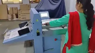 Automatic Creasing perfroation machine  DG Line touch operated  by  a Lady doing 40000 sheets/day