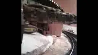 HO SCALE LAyout curve adjustment with a few cars pulled by Santa fe
