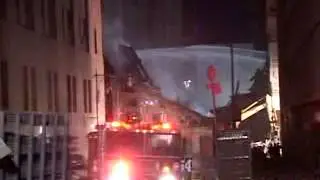 wtc site, firemen spraying with cranes, debris, night