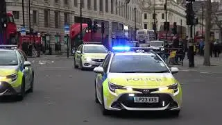 3 ERPT (emergency response policing team) cars responding in trafalgar square.