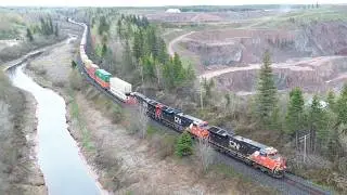 Awesome Aerial View - 60 fps! Huge Stack Train CN 120 pass Rock Quarry approaching Memramcook, NB