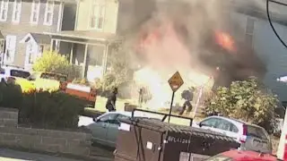 Video shows Columbus firefighter rescuing dog from house fire