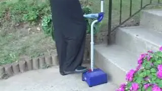 Pilot&reg; Step-Up Cane - a Quad with a flip-up step