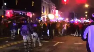 SWAT team members use pepper spray against Ohio State fans