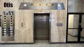 Винтажный подъемник Otis Traction на парковке Riverview Plaza в Пеории, штат Иллинойс