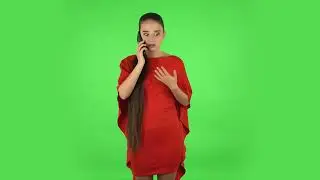 Pretty Young Woman Is Upset Speaking on the Phone, Proving Something  Green Screen No Copyright