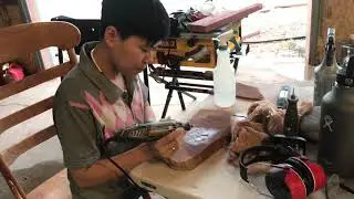 Carving Om Mani Stone