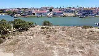 Waterfront Living Starts Here &ndash; Vacant Stand in Gated Private Estate