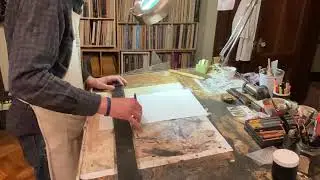George Cochrane in the Studio: Preparing a page for lettering.