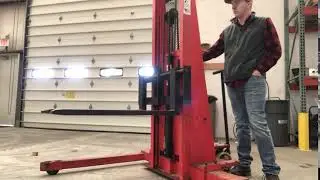 Used 2,000 lb capacity PrestoLifts Model PSA Straddle Stackers