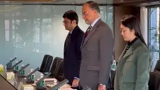 Visit to Power China: Ahsan Iqbal observes a minute's silence for Karachi attack victims