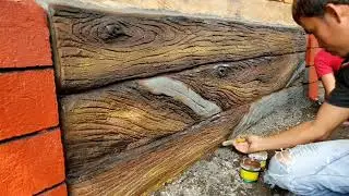 cement wall . painting into wood design.