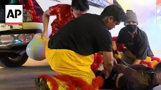 Thai police use Lunar New Year lion costumes to arrest suspect