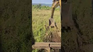Excavator Moving Mud in Wet Field | Heavy Equipment Working in Soft Soil 