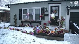 Flowers pile up outside the home of Windsor Heights murder victim