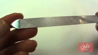 Seki Edge Nail File with Pusher is Multi-Faceted. Push Down Cuticles and File Nails All at Once!