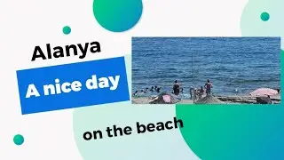 Alanya beach, playing with a smart dog by its owner